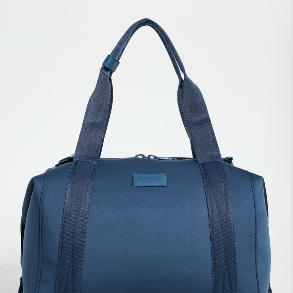 Dagne Dover Blue Travel Bag with Durable Fabric and Structured Design